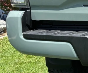 Tacoma Painted 6X3 Lunar Rock Driver Rear Bumper End Cap LH 16-23 W/O Sensor